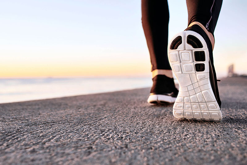 closeup-sport-shoes-concrete-path.jpg
